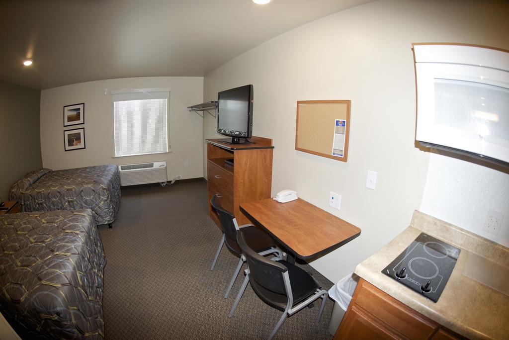 Woodspring Suites Williston Quarto foto